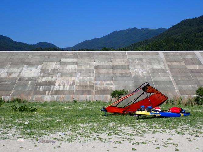 Camp next to "tsunami wall" at Yoshihama