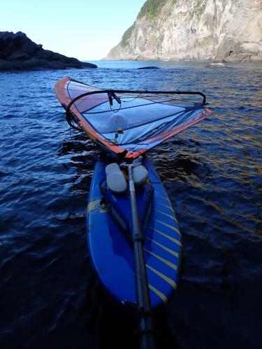 A break in the shade of a steep cliff