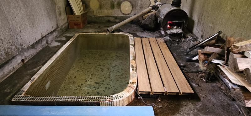 Off-grid onsen, Shimamaki. 36ºC water is topped up to "toasty" by a log burner