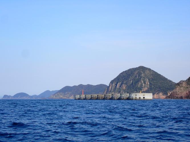 A curious breakwater design. Against the current, and on a collision course with a fishing vessel returning to port, it was a full effort pumpathon to get past this